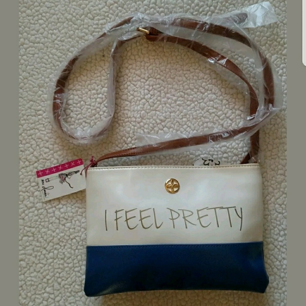 Miss Darcee, "I Feel Pretty," color block purse.